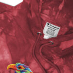 Eagle head mascot - Unisex Champion tie-dye hoodie